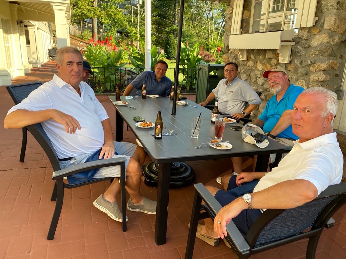 FOB members at the outdoor table