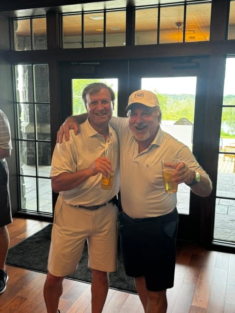 Celebrating in the Saratoga National clubhouse